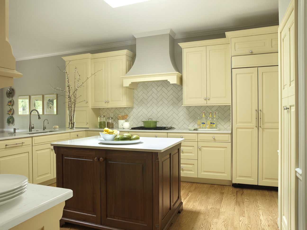 light yellow kitchen with gray cabinet